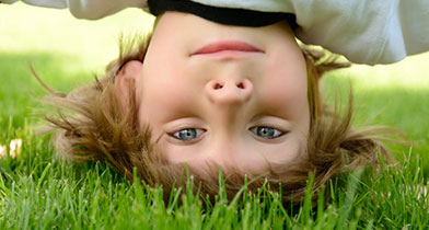 child-upsidedown-healthy-lawn.jpg